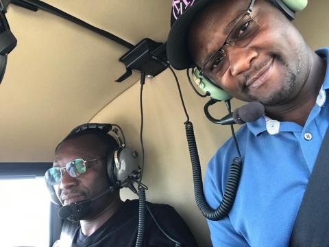 FAS SEP SPS Fellows Fly in Helicopter for Aerial Fertilizer Application at MSU